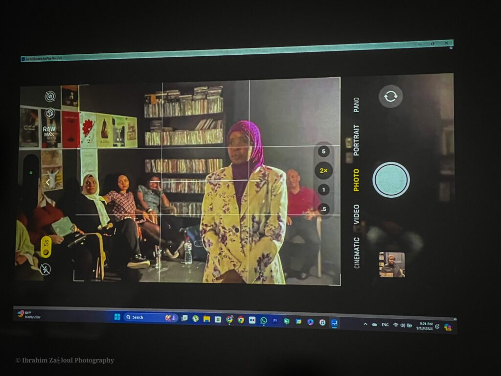 image of cell phone filming an interview